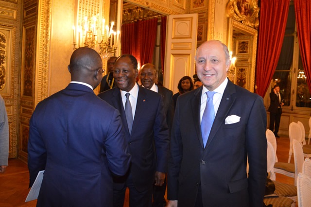 Le Président ivoirien, Alassane Ouattara a assisté à la Signature du 2ème C2D entre la France et la Cote d´Ivoire , le 03 décembre 2014,au Quai d´Orsay.